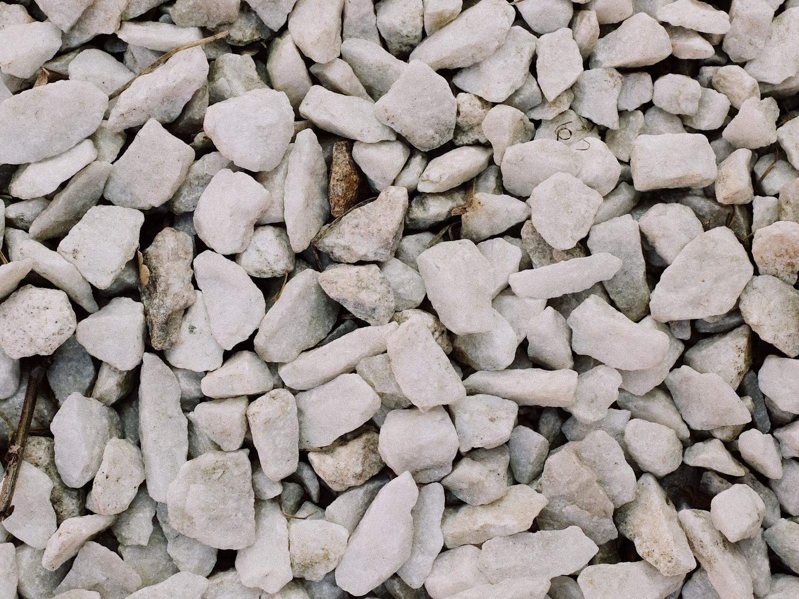 Close-up of white crushed quartz grit granules